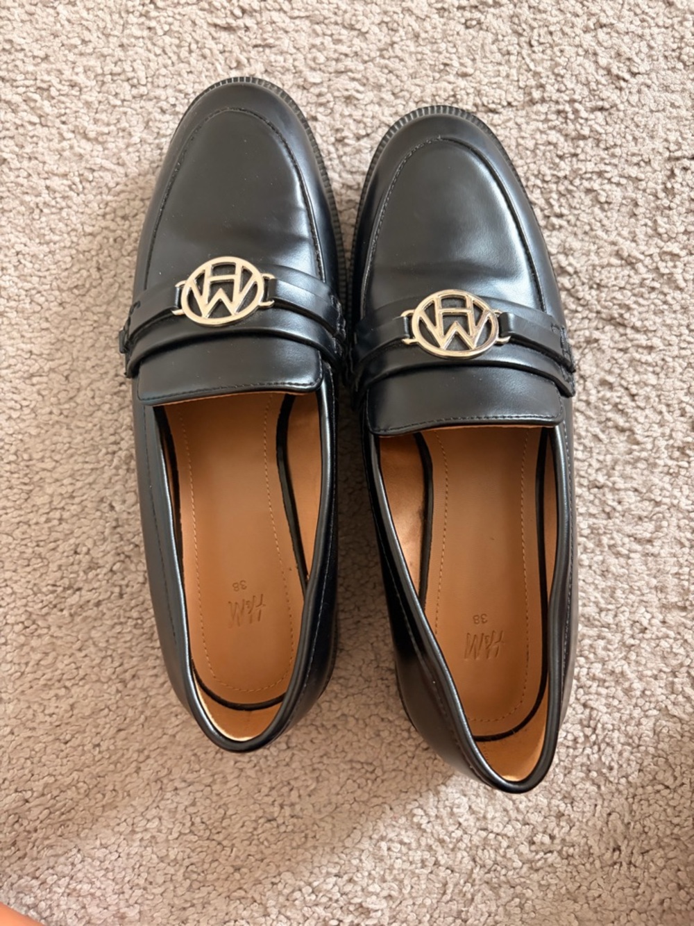 H&M Black Leather Women's Loafers with Gold Emblem